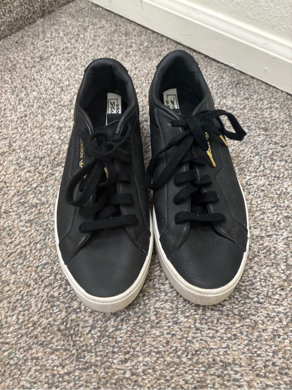 adidas Black Leather Low-Top Sneakers with Gold Accents